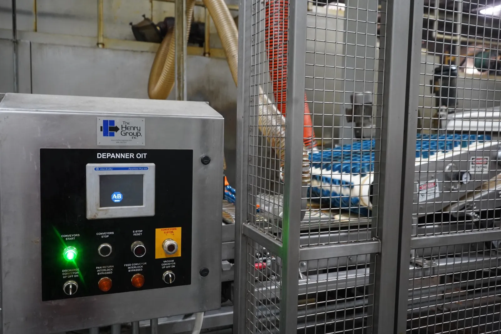 Operator controls and guarded conveying equipment