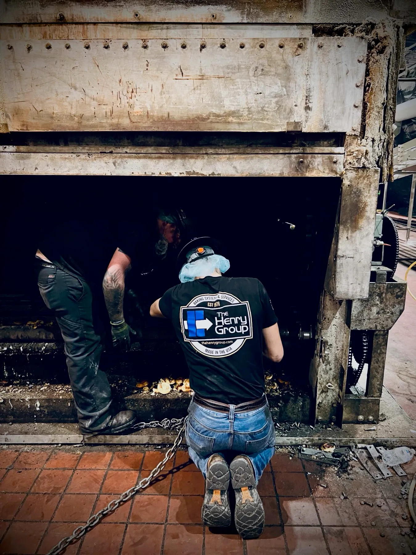 Field crew working on an industrial oven