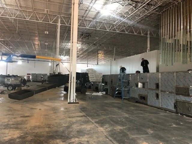 Oven modules being assembled inside a production facility