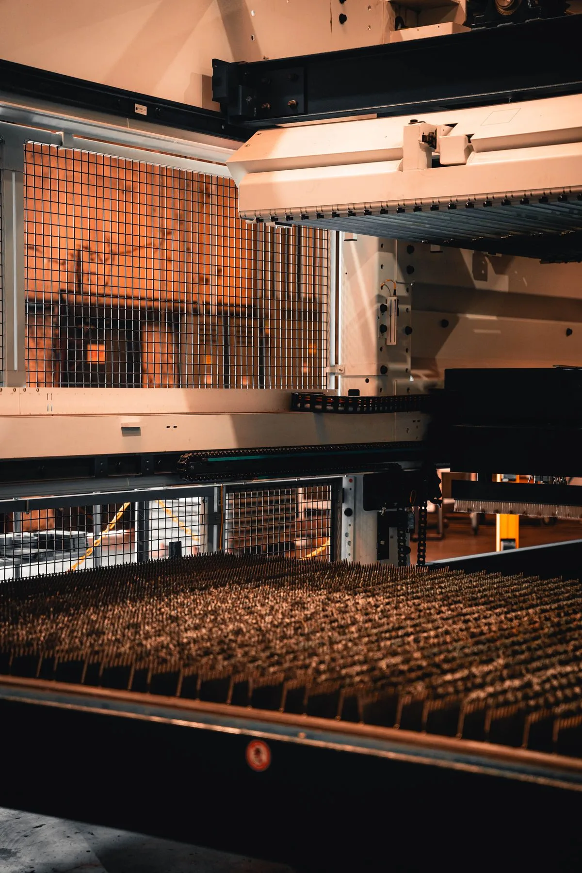 Sheet handling equipment above the flat-sheet laser bed