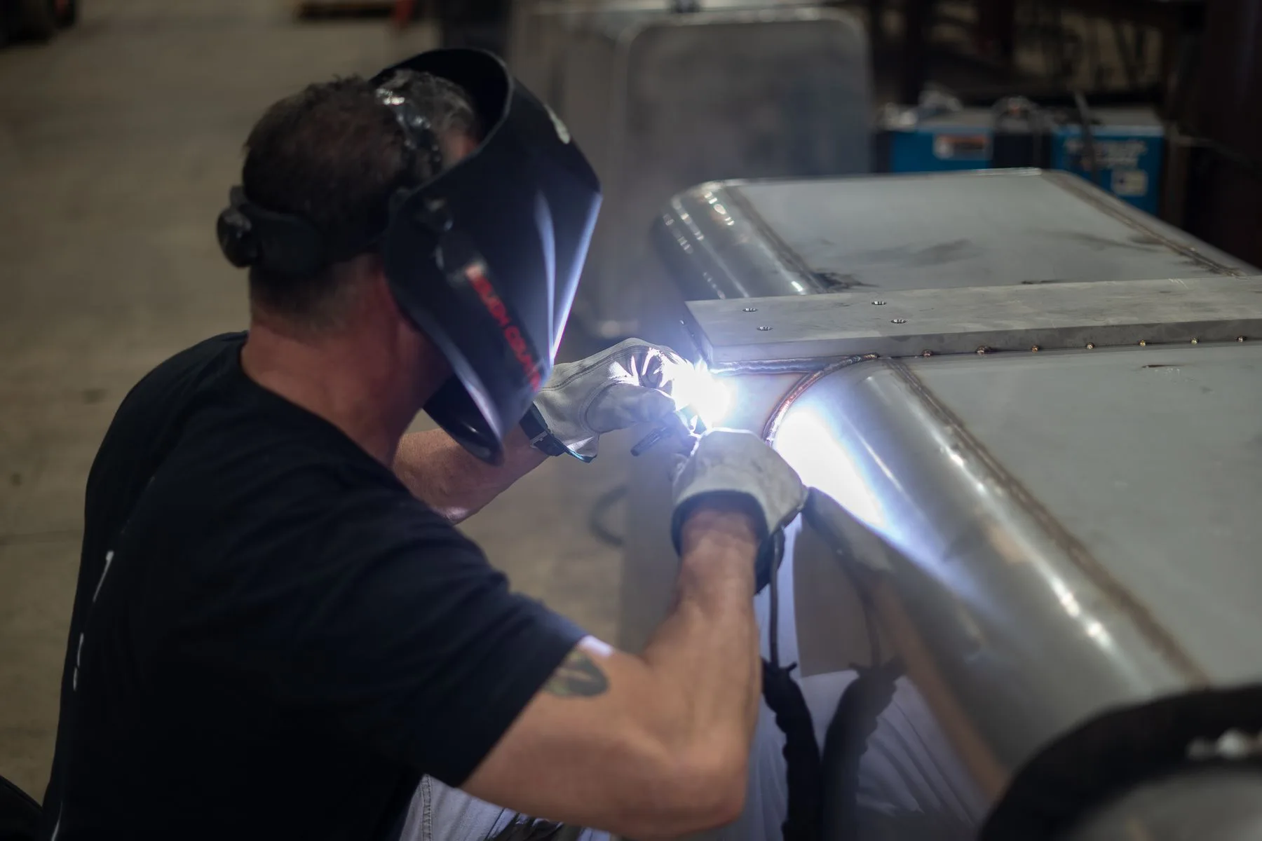Welding a stainless-steel trough in the THG shop