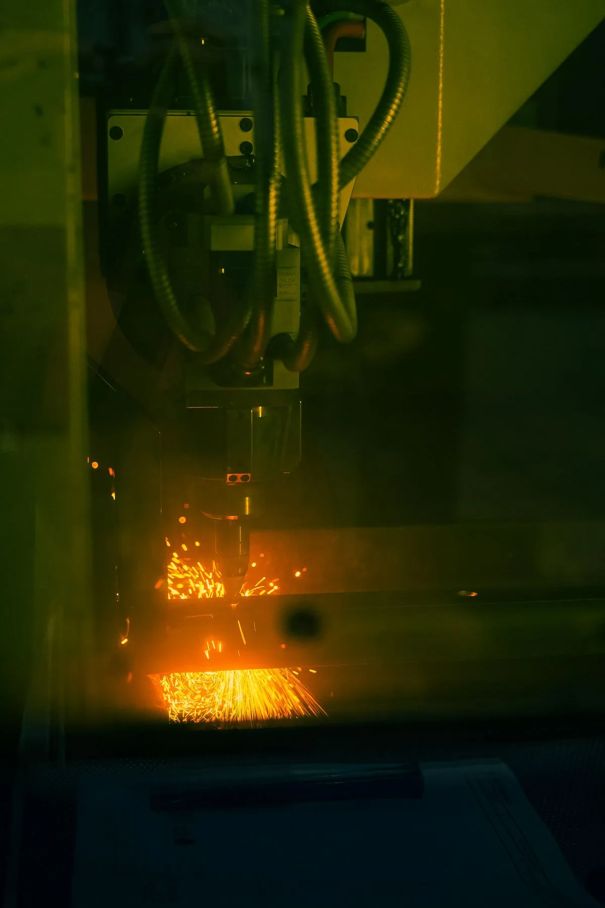 Laser cutting metal inside the guarded tube laser